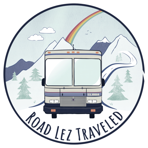 Logo with safari trek rv trees mountains rainbow