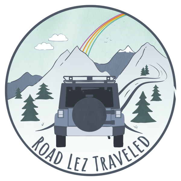 Logo with jeep wrangler trees mountains rainbow
